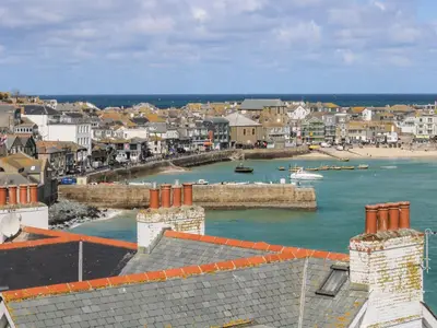 a view of a town with a body of water at Villa 80 in St Ives