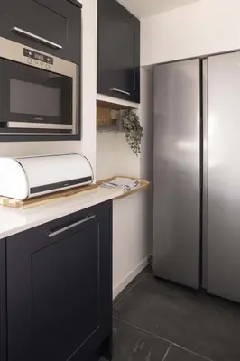 a kitchen with a refrigerator and a microwave at Gorgeous Cottage Parking Short Walk to Beach in Gorran Haven