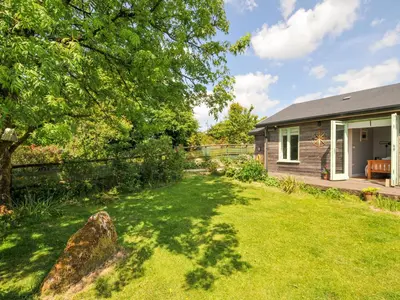a home with a yard with a house at Smugglers in Bodmin