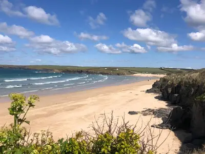 a view of a beach with the ocean at Fifty Steps from the beach! in St Merryn