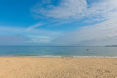 a sandy beach with the ocean in the background at Ocean View in Carbis Bay