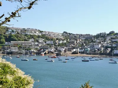 a bunch of boats in a body of water at Byre Cottage in Fowey