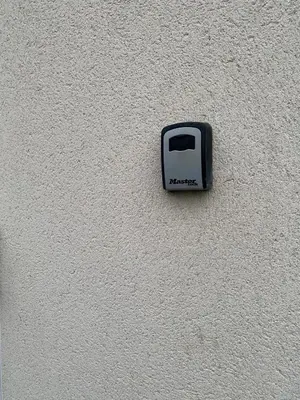 a black and white toaster on the side of a wall at Seaside Cabin Perranporth in Perranporth