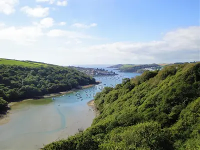 an aerial view of a river with boats in it at Cornish country house by the coast near Fowey in Lanteglos