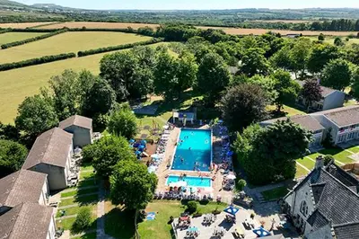 an aerial view of a resort with a swimming pool at 4 Bed in Newquay oc-c30589 in Saint Columb Major