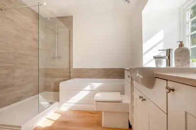 a bathroom with a shower and a toilet and a sink at 2 Bed in St. Gluvias oc-c29724 in Ponsanooth
