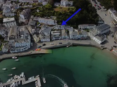 an aerial view of a city with a harbor at Workshop in Saint Mawes