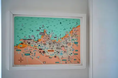 a framed picture of a map on a wall at Finest Retreats - Tamsin in Newquay