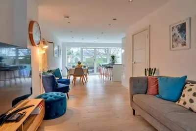 a living room with a couch and a table at Finest Retreats - Tamsin in Newquay
