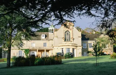 a large house on a grassy field at Epiphany House in Kenwyn