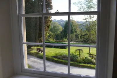 an open window with a view of a park at Epiphany House in Kenwyn
