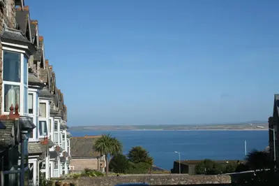 a view of the ocean from between buildings at Rivendell Guest House in St Ives