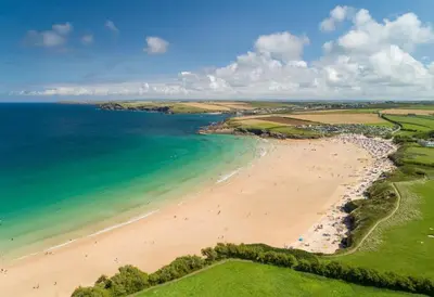 an aerial view of a beach and the ocean at The White House in St Merryn
