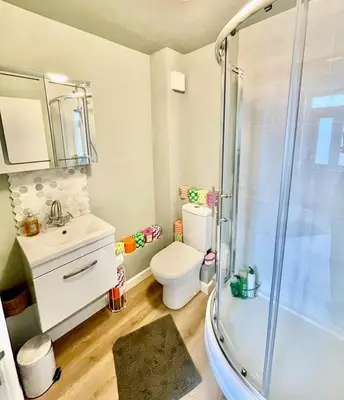a bathroom with a shower and a toilet and a sink at Apartment in Constantine in Constantine