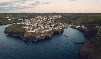 an aerial view of a small island in the water at Charming Cottage & Garden in Port Isaac in Port Isaac