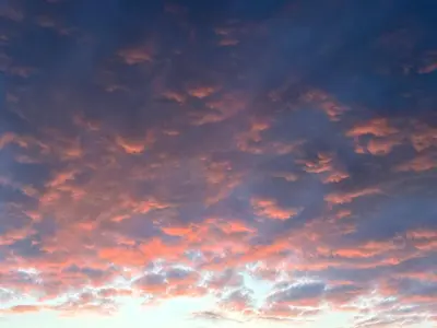 a sky filled with lots of clouds at sunset at Kudhva 4 in Treknow