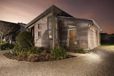 a small house is shown at night at 71 Una, Carbis Bay in Carbis Bay