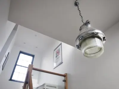 aendant light hanging from a ceiling in a room at The Observatory Tower in Falmouth