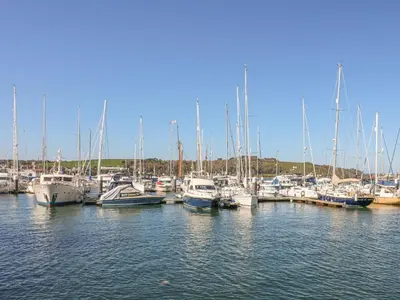 a bunch of boats docked in a harbor at The Observatory Tower in Falmouth