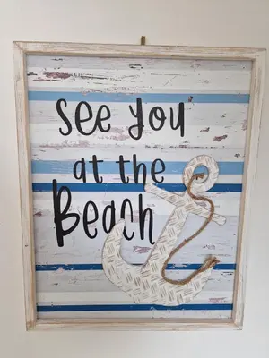 a sign that says see you at the beach at Harbour View apartment in Portreath in Portreath