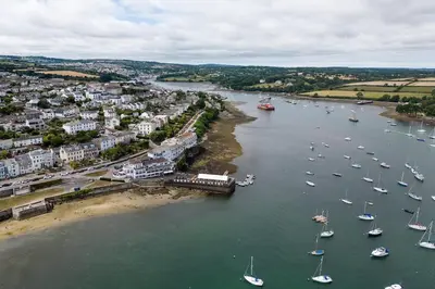 an aerial view of a harbor with boats in the water at The Little Pines - 5 min walk to beach and sauna in Falmouth