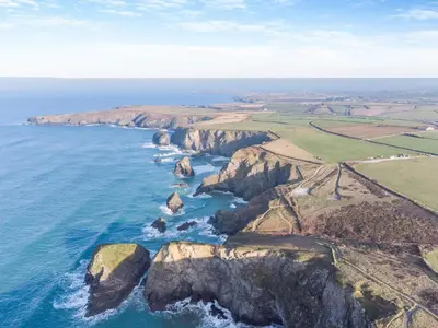 an aerial view of rocks in the ocean at 3 Bed in St. Eval oc-k30666 in Saint Eval