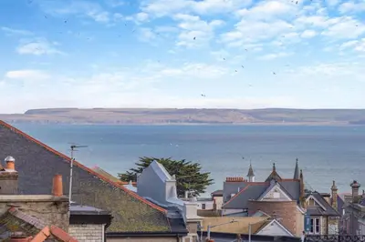 a view of the ocean from a town with houses at 3 Bed in St. Ives oc-c30654 in St Ives