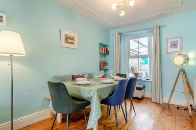a dining room with a table and chairs at 3 Bed in St. Ives oc-c30654 in St Ives