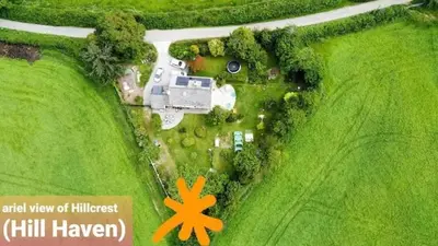 an aerial view of a house in a field at Hillview Haven in Liskeard