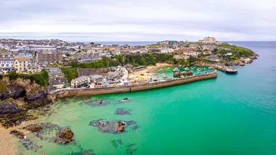an aerial view of a beach with a city at Cosy Cornish Cottage with Firepit & Parking in Newlyn East