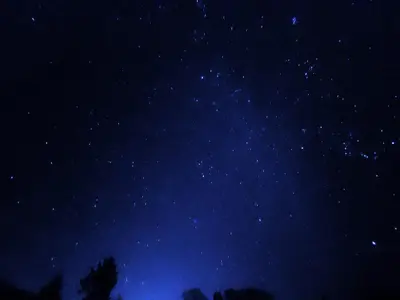 a night sky with a lot of stars at Malt-Barn Conversion, with access to Pool & Hot Tub-at Fox Valley Cottages in Lansallos