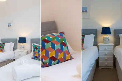 two pictures of a bedroom with two beds and two lamps at Cockleshells in St Ives