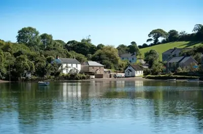a large body of water with houses and a town at Riverside in Kea