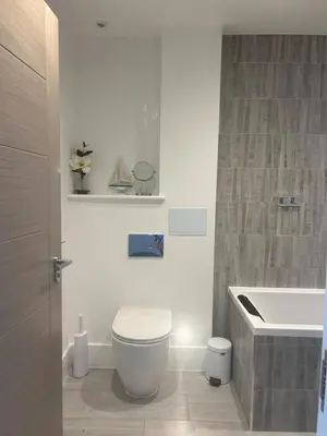 a bathroom with a toilet and a sink at Perpetual House St Ives Cornwall in St Ives
