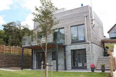 a contemporary house with a glass roof at House 17 in Looe