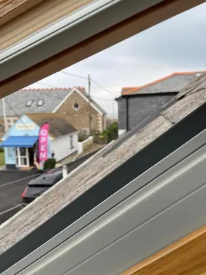 a view of a street from a window in a house at Sea Glimpses Studio Port Isaac in Port Isaac
