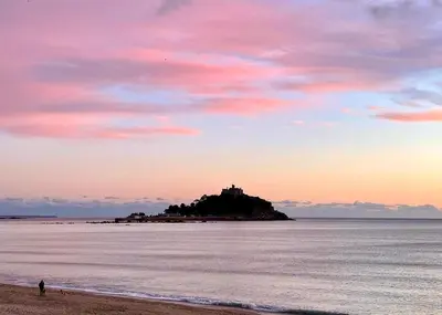 an island in the ocean with a castle on it at The Lake House , luxury rural retreat in Ladock