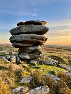 a pile of rocks sitting on top of a field at The Lake House , luxury rural retreat in Ladock