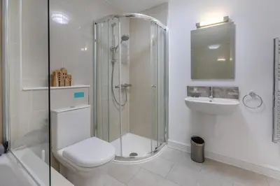 a bathroom with a shower and a toilet and a sink at 4 Bed in Lelant oc-a30881 in Carbis Bay
