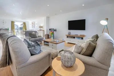 a living room with two couches and a tv at 4 Bed in Lelant oc-a30881 in Carbis Bay