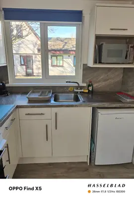 a kitchen with a sink and a window at Tolroy manor holiday cottage in Saint Erth