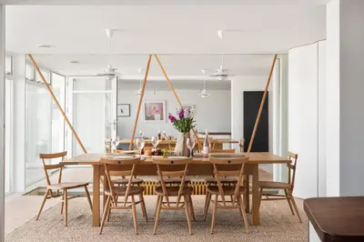 a dining room with a wooden table and chairs at 11 Piazza in St Ives