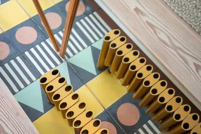 two chairs sitting on a checkered floor at 11 Piazza in St Ives