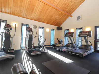 a gym with several treadmills and exercise bikes at Hepworth in Redruth