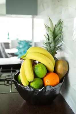 a bowl of fruit sitting on a table at The Vacation, Cozy Static Caravan in Newquay in Newquay