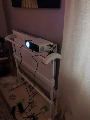 a video game system sitting on top of a radiator at Cornish Cottage in Newquay