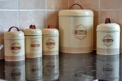 a group of five coffee tins sitting on a counter at Finest Retreats - Chy Merthen East in Marazion