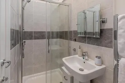 a bathroom with a sink and a shower at 2 Bed in St. Ives oc-k30934 in Carbis Bay
