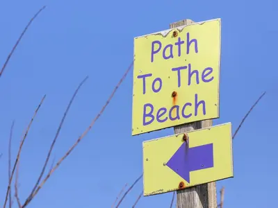 a sign that reads path to the beach at Atlantic Escape in Bude