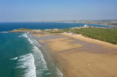 an aerial view of a beach and the ocean at Finest Retreats - Carworgie Cottage in Newquay